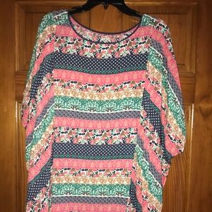 Beautiful floral/geometric pull-over with fringe
